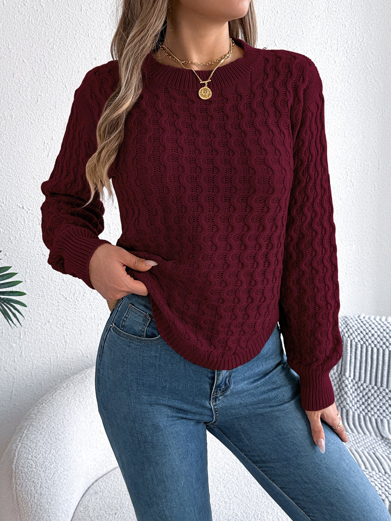 Pull femme à manches lanternes torsadées