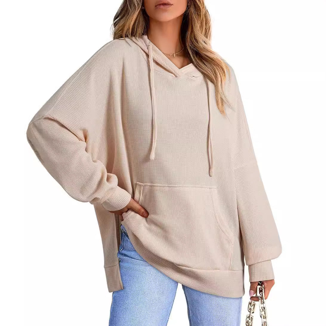 Sweat-shirt pour femme avec poche et manches longues.